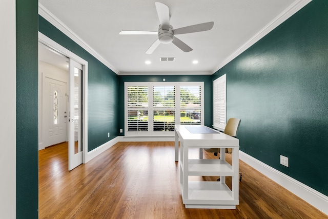 8831 Lanarkshire Dr, Dallas, TX 75238 - dining area with crown molding, wood finished floors, ceiling fan, baseboards, and recessed lighting