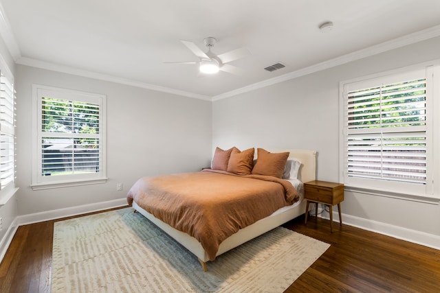 8831 Lanarkshire Dr, Dallas, TX 75238 - bedroom with wood finished floors, baseboards, crown molding, and ceiling fan
