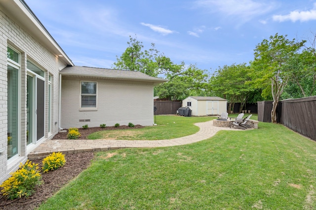8831 Lanarkshire Dr, Dallas, TX 75238 - view of yard featuring an outdoor fire pit and a patio