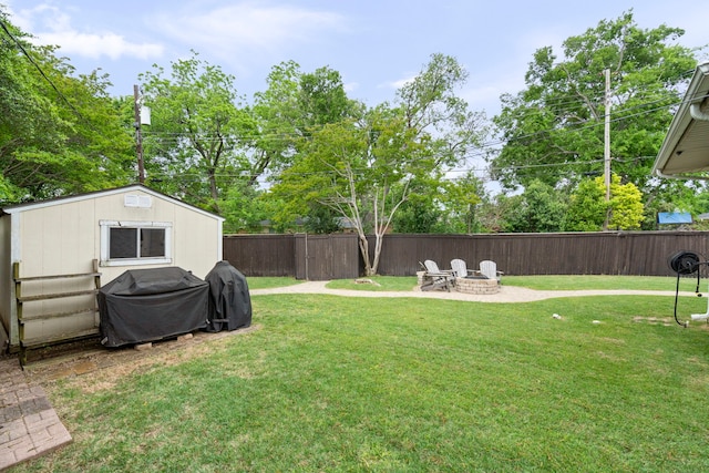 8831 Lanarkshire Dr, Dallas, TX 75238 - view of yard featuring a fire pit and an outdoor structure