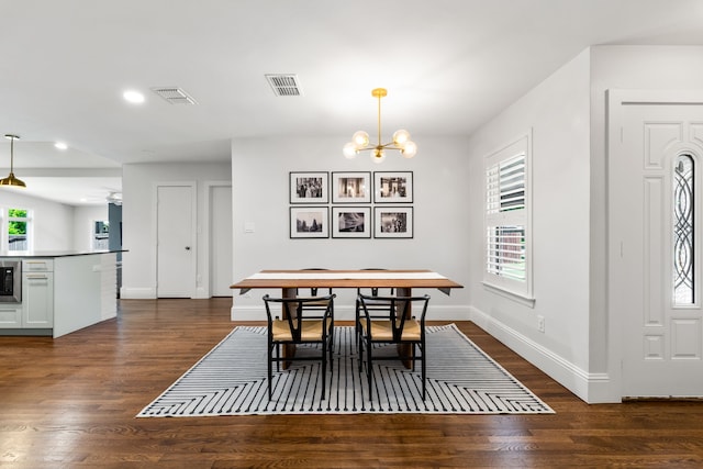 8831 Lanarkshire Dr, Dallas, TX 75238 - dining room with a chandelier, dark wood-style flooring, baseboards, recessed lighting, and a ceiling fan