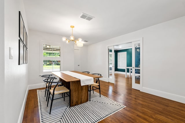 8831 Lanarkshire Dr, Dallas, TX 75238 - dining space with baseboards, a chandelier, french doors, and wood finished floors
