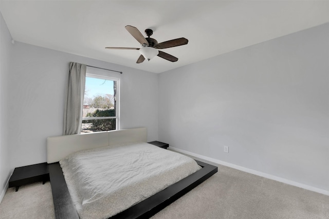 1130 Via Del Rey, Mesquite, TX 75150 - bedroom with ceiling fan, light carpet, and baseboards