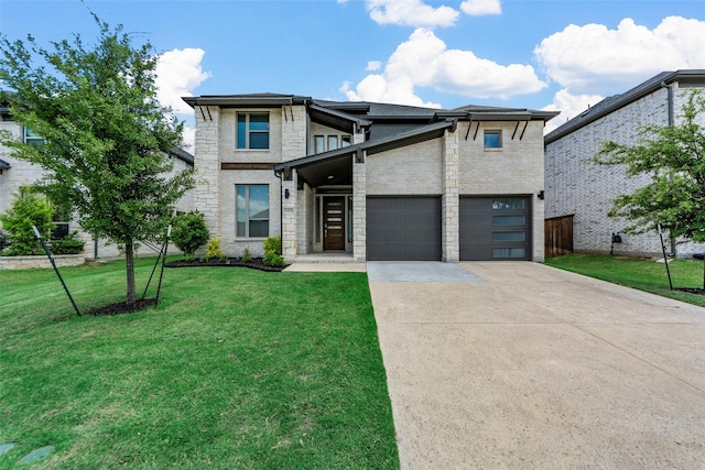 2472 Bainbridge Dr, Allen, TX 75013 - view of front facade featuring driveway, brick siding, and an attached garage