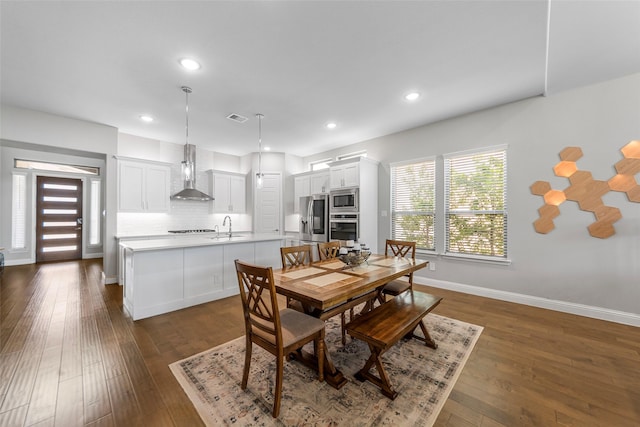2472 Bainbridge Dr, Allen, TX 75013 - dining space with dark wood-style flooring, baseboards, and recessed lighting