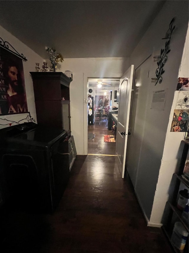hallway featuring dark wood-style floors