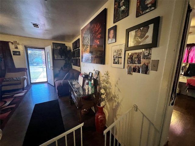 corridor featuring visible vents