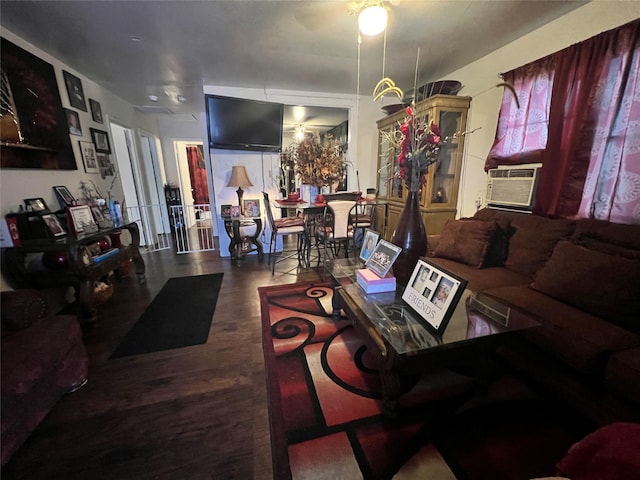 living room with cooling unit and wood finished floors
