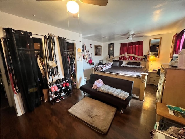 bedroom with a ceiling fan and wood finished floors