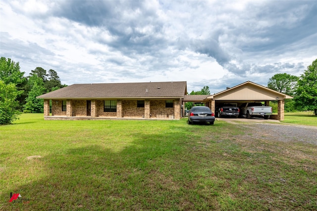 171 Columbia Road 84, Magnolia, AR 71753 - ranch-style home with driveway, a front yard, and brick siding
