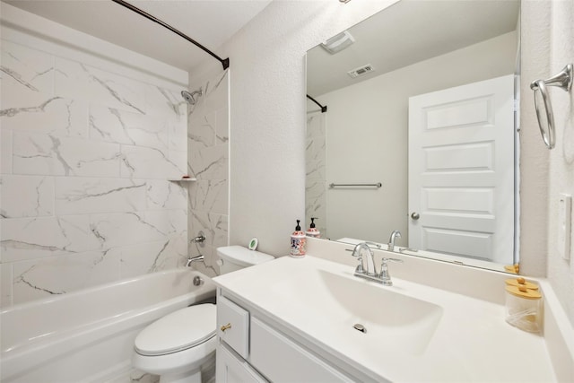 bathroom featuring toilet, bathing tub / shower combination, vanity, and visible vents