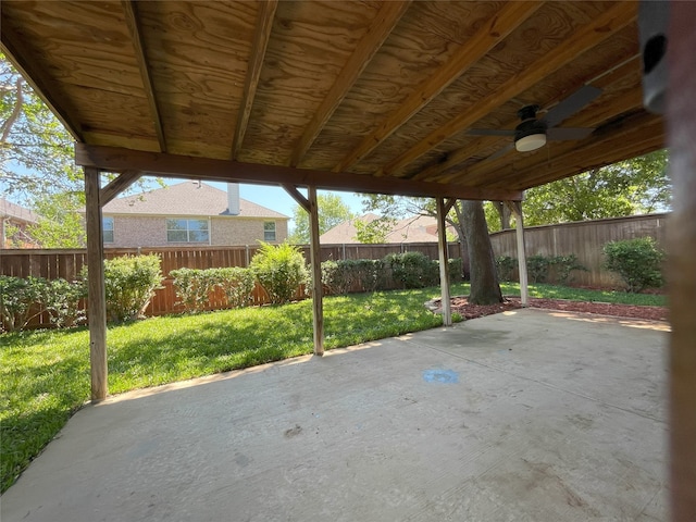 view of patio featuring a fenced backyard and ceiling fan