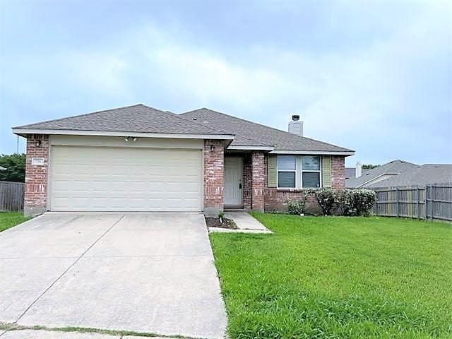 714 Kinston Ct, Wylie, TX 75098 - ranch-style house with concrete driveway, brick siding, and fence