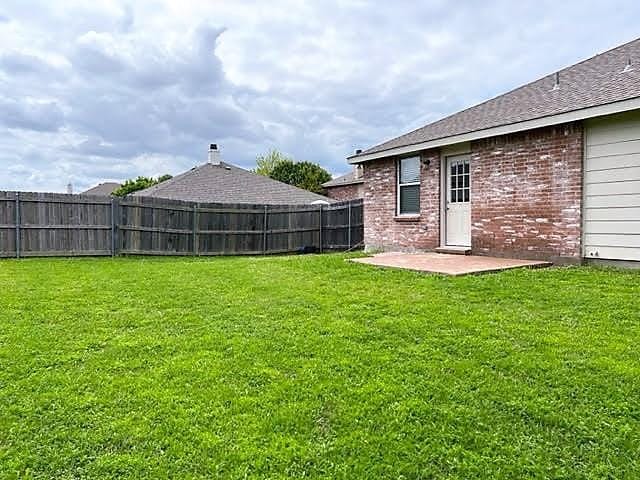 714 Kinston Ct, Wylie, TX 75098 - view of yard featuring a patio area and a fenced backyard