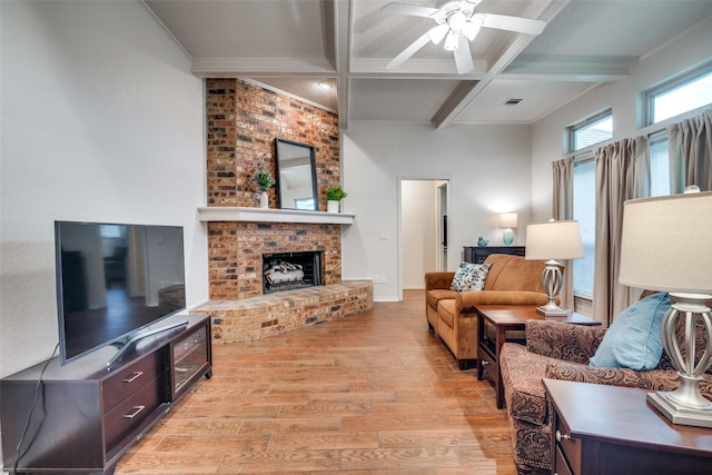 2605 Nighthawk Dr, Plano, TX 75025 - living area with visible vents, light wood finished floors, ceiling fan, beamed ceiling, and coffered ceiling