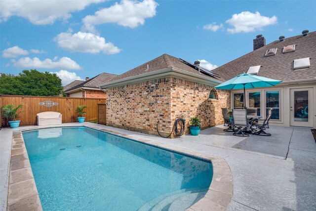 2605 Nighthawk Dr, Plano, TX 75025 - view of pool with a patio area, a fenced backyard, and outdoor dining space