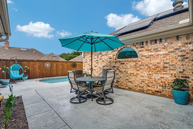 2605 Nighthawk Dr, Plano, TX 75025 - view of patio featuring outdoor dining space and a fenced backyard