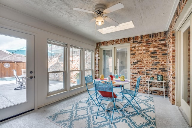 2605 Nighthawk Dr, Plano, TX 75025 - sunroom featuring a textured ceiling, french doors, and a skylight