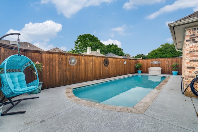 2605 Nighthawk Dr, Plano, TX 75025 - view of swimming pool with a fenced backyard and a patio area