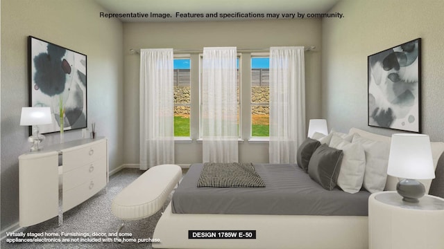 carpeted bedroom with baseboards