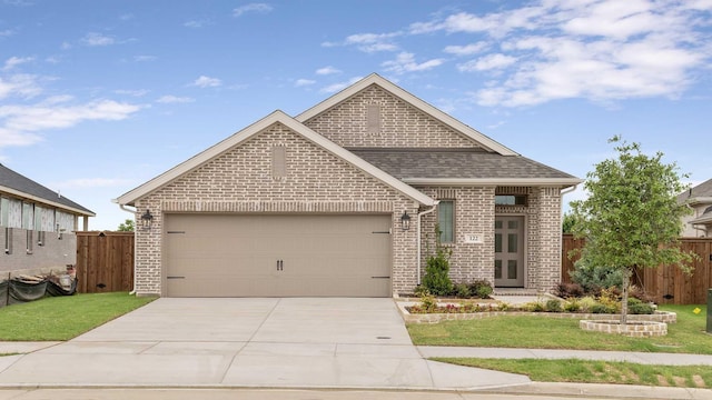 122 Palo Duro Bnd, Rhome, TX 76078 - view of front of house featuring brick siding, driveway, a garage, and a shingled roof