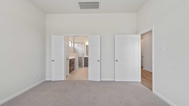 122 Palo Duro Bnd, Rhome, TX 76078 - unfurnished bedroom with light colored carpet and ensuite bathroom