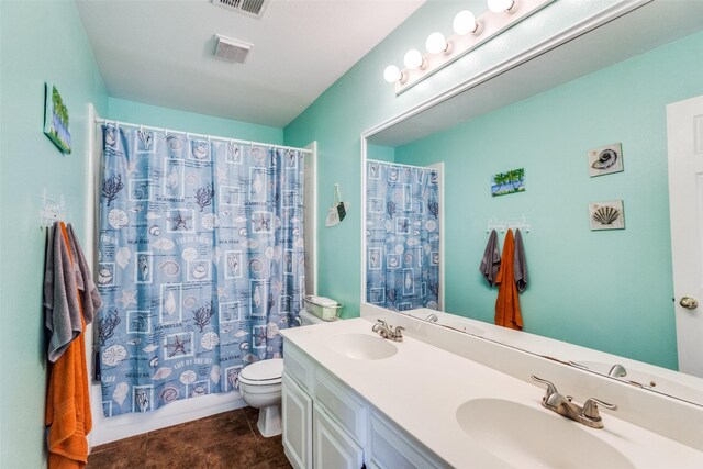 4219 Voss Hills Pl, Dallas, TX 75287 - bathroom featuring a sink, double vanity, toilet, and visible vents