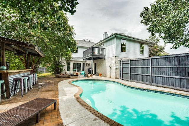 4219 Voss Hills Pl, Dallas, TX 75287 - view of pool with a fenced backyard, a patio area, a fenced in pool, and outdoor dry bar