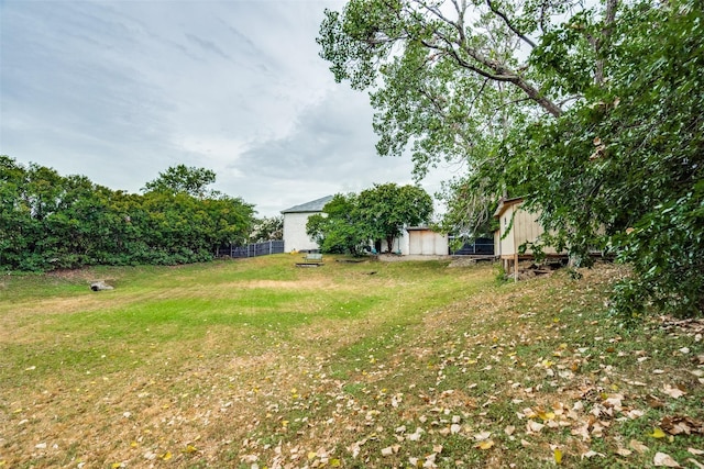 4219 Voss Hills Pl, Dallas, TX 75287 - view of yard with an outdoor structure and fence