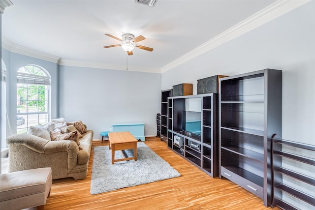 4219 Voss Hills Pl, Dallas, TX 75287 - living area featuring ornamental molding, visible vents, wood finished floors, and ceiling fan