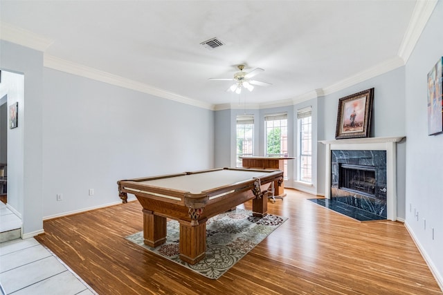 4219 Voss Hills Pl, Dallas, TX 75287 - rec room with crown molding, a ceiling fan, visible vents, and light wood-type flooring