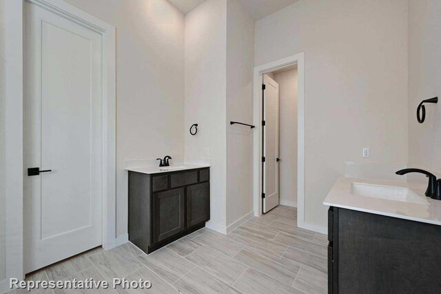 11745 Edgewood Dr, Justin, TX 76247 - bathroom with vanity and baseboards