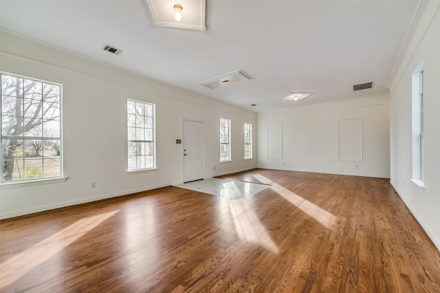 875 Country Club Rd, Lucas, TX 75002 - entrance foyer featuring ornamental molding, baseboards, visible vents, and wood finished floors