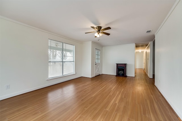 875 Country Club Rd, Lucas, TX 75002 - unfurnished living room with attic access, visible vents, crown molding, a ceiling fan, and baseboards