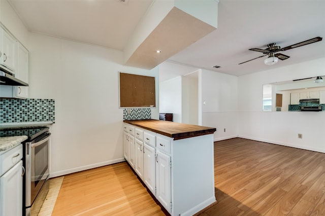 875 Country Club Rd, Lucas, TX 75002 - kitchen featuring wood counters, tasteful backsplash, electric stove, and under cabinet range hood