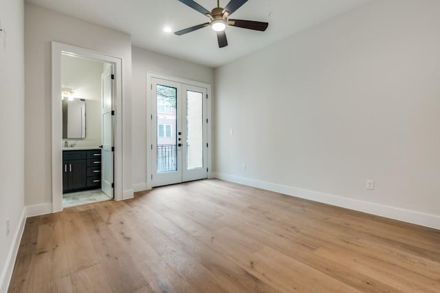 235 E Nash St Unit 118, Grapevine, TX 76051 - interior space with baseboards, light wood-style floors, ceiling fan, and a sink