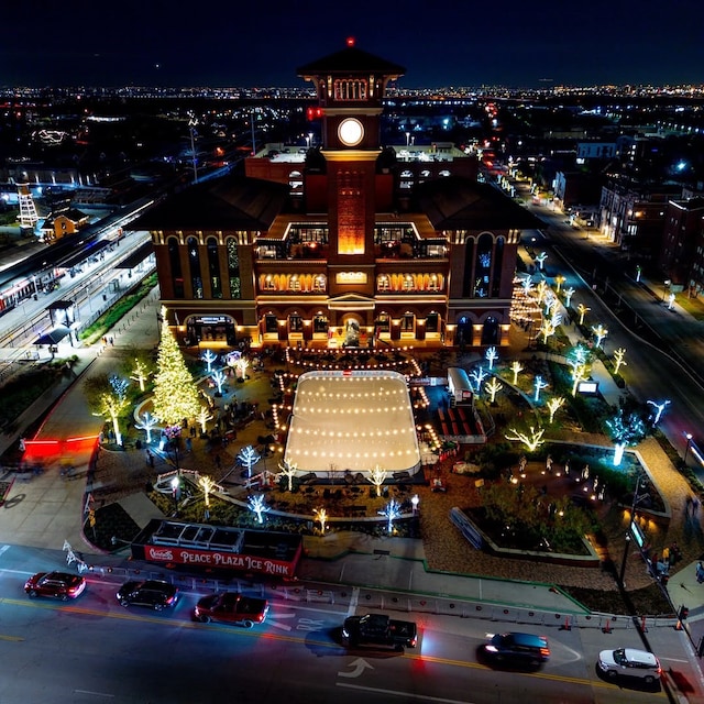 235 E Nash St Unit 118, Grapevine, TX 76051 - aerial view at night featuring a view of city lights