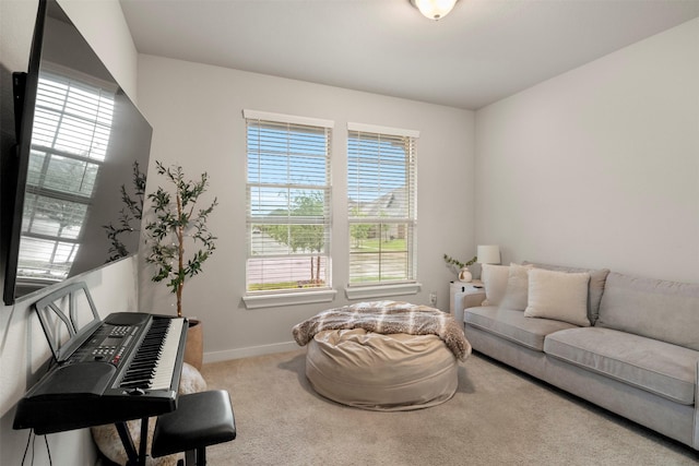 421 Hummingbird Dr, Celina, TX 75009 - living room featuring carpet floors, healthy amount of natural light, and baseboards