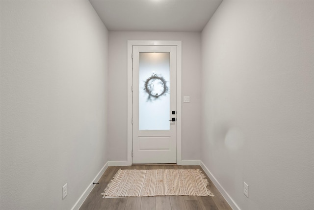 421 Hummingbird Dr, Celina, TX 75009 - doorway to outside with dark wood-style flooring and baseboards