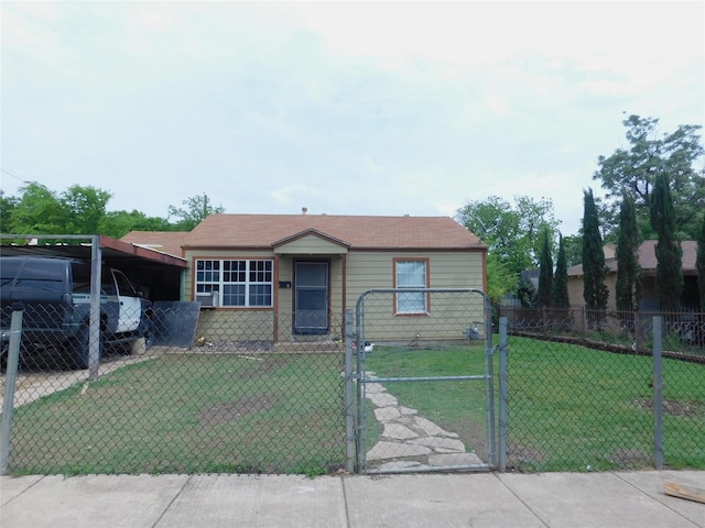 bungalow-style home with a front yard, a fenced front yard, and a gate