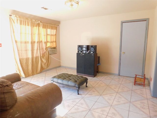 living room with visible vents and baseboards