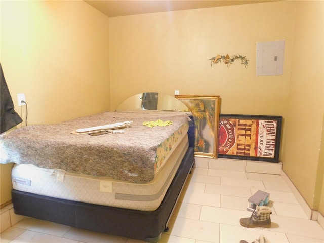 tiled bedroom with electric panel