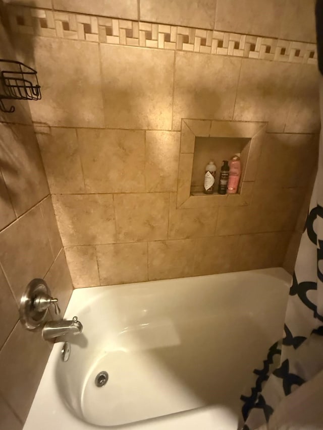1104 County Road 701, Cleburne, TX 76031 - bathroom with shower / bathtub combination with curtain