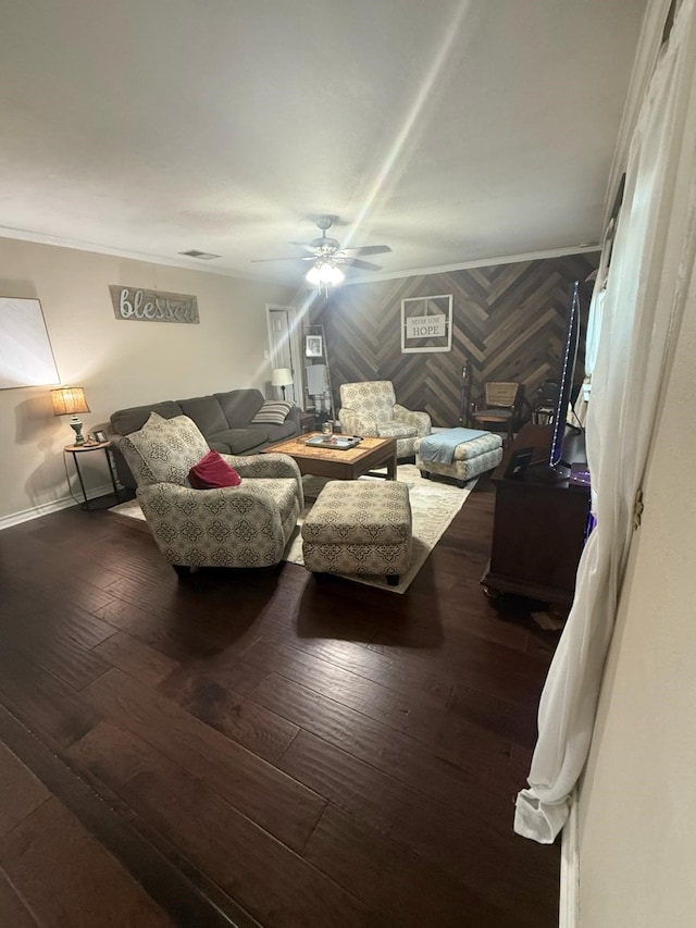 1104 County Road 701, Cleburne, TX 76031 - living area with a ceiling fan, hardwood / wood-style floors, crown molding, and baseboards