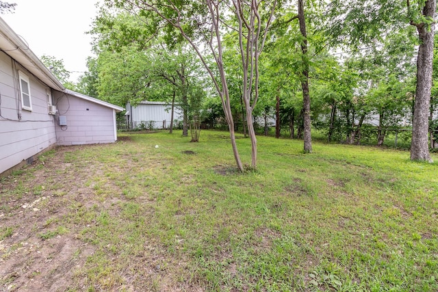 303 E 8th St, Kaufman, TX 75142 - view of yard featuring fence
