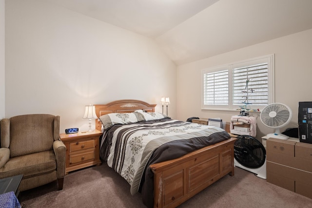 carpeted bedroom featuring vaulted ceiling