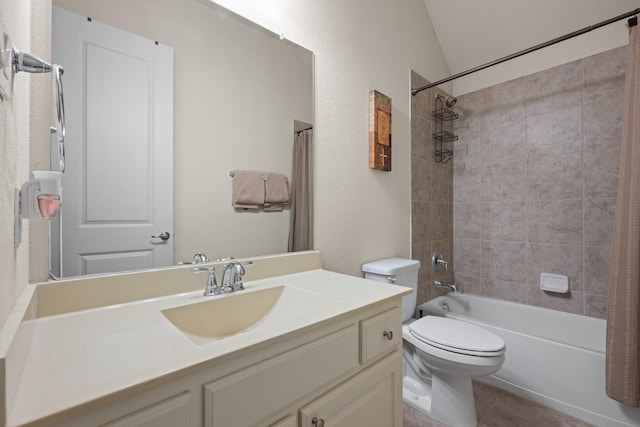 full bathroom with toilet, lofted ceiling, vanity, shower / tub combo with curtain, and tile patterned flooring