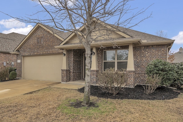 ranch-style home featuring roof with shingles, an attached garage, brick siding, concrete driveway, and a front lawn