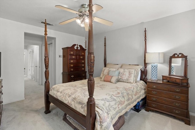 bedroom featuring ceiling fan, carpet flooring, and visible vents
