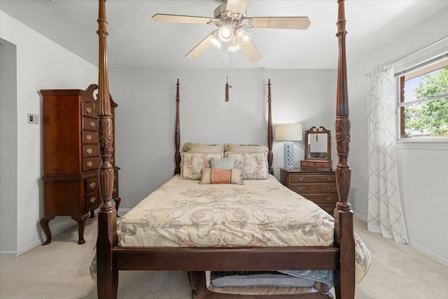 bedroom featuring carpet floors, a ceiling fan, and baseboards